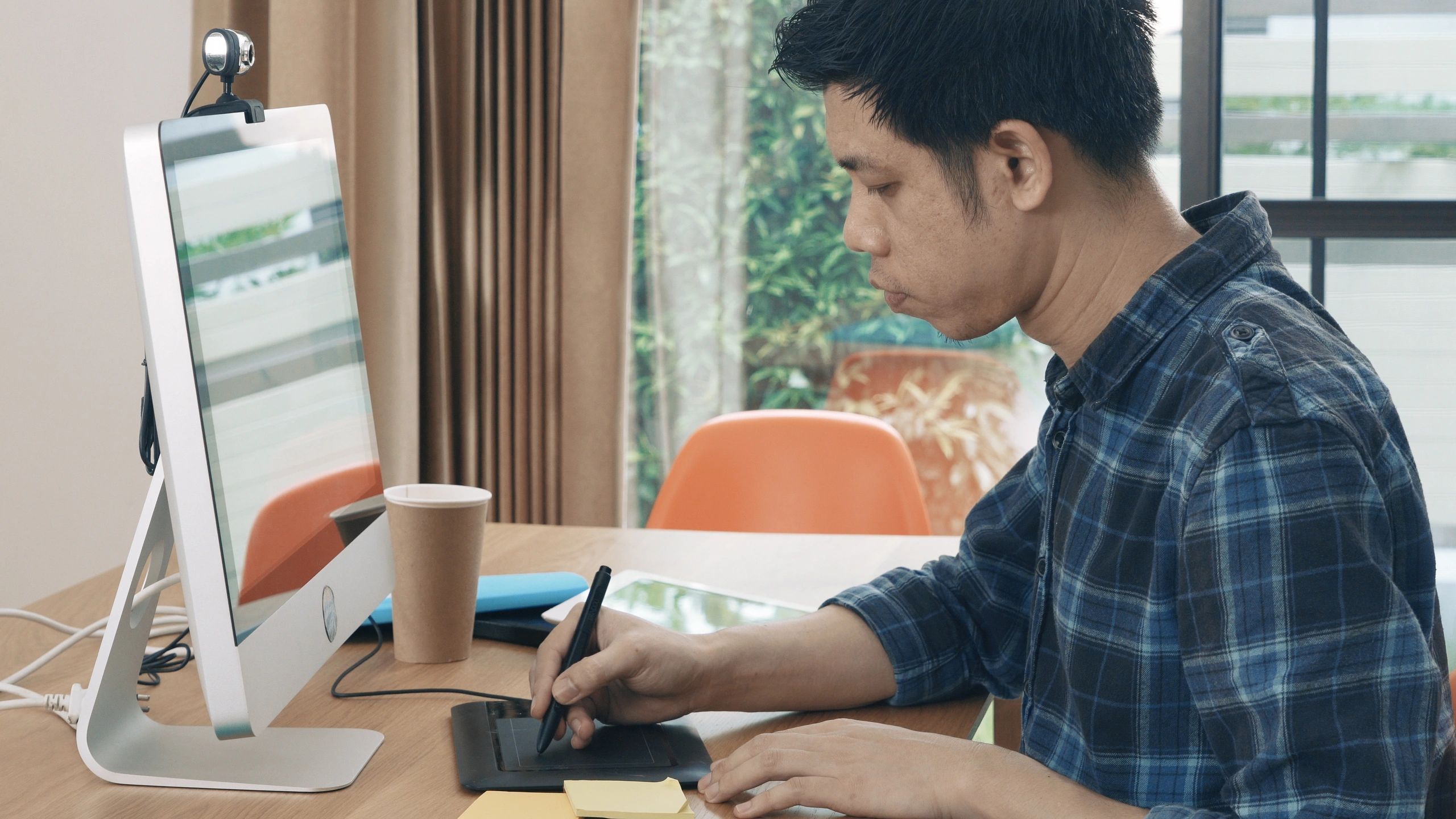 Graphic designer working at branding desk