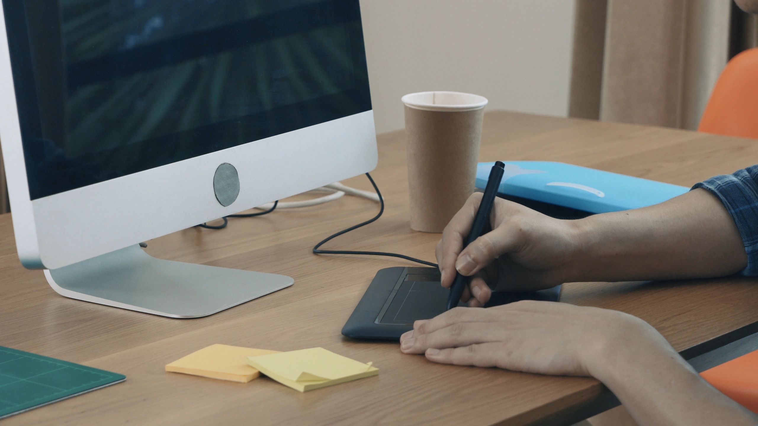 Designer working on branded merchandise concepts