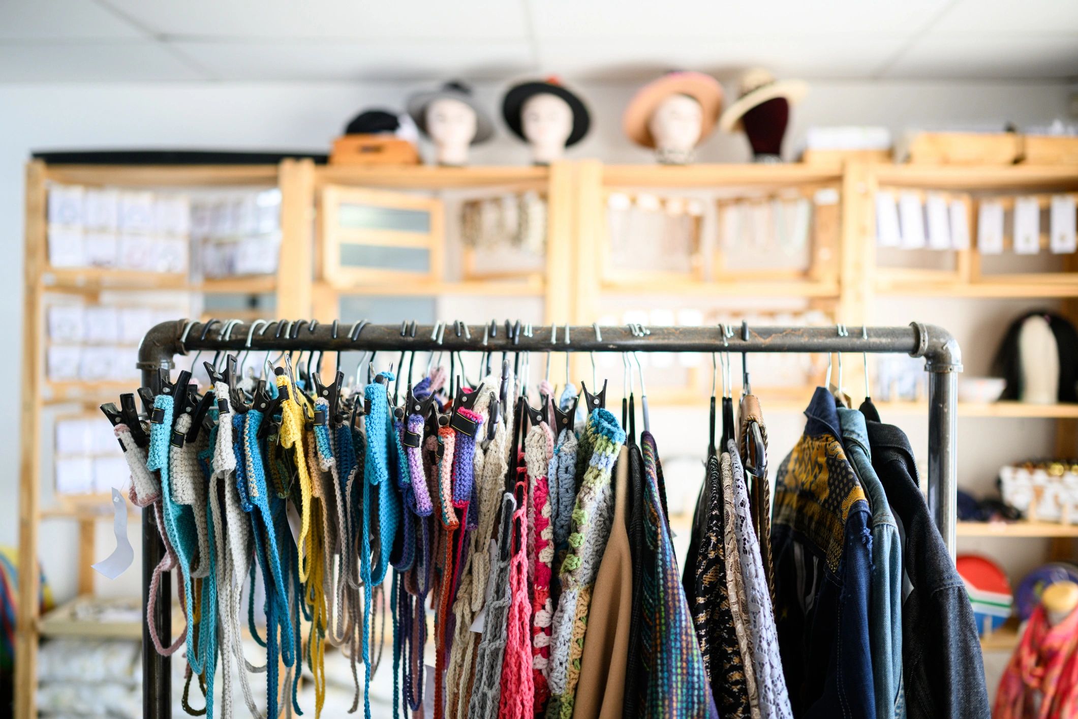 Colorful shirt display on retail rack